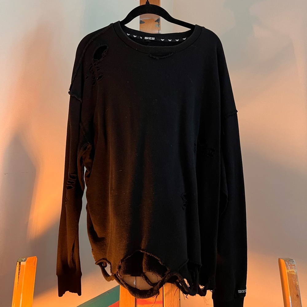 Men’s Long sleeve distressed shirt.